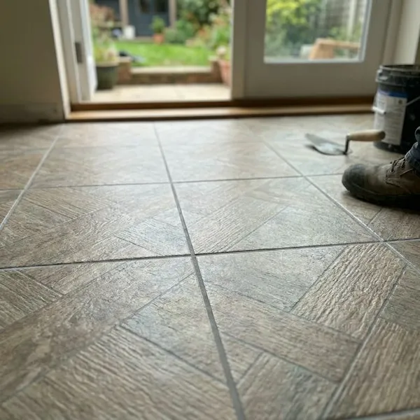 Outdoor tile installation on a patio